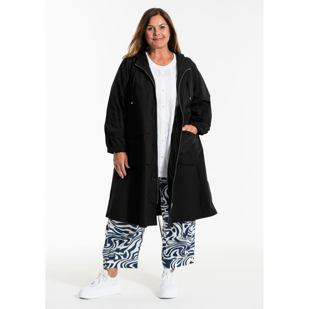 Gozzip Woman GBeate a-shaped coat with no embroidery Coat Black